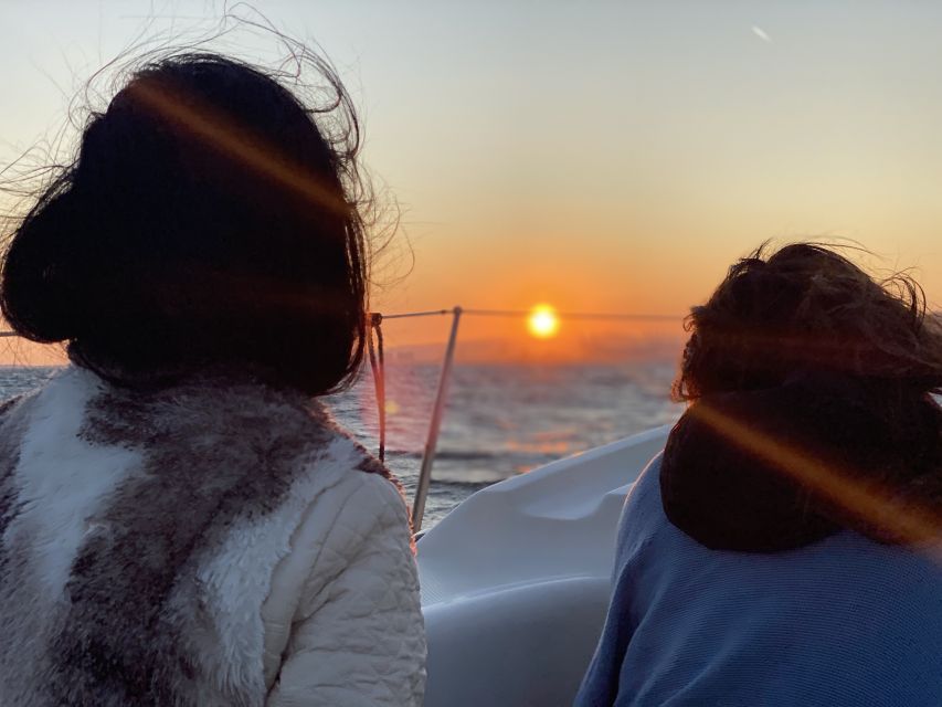 Barcelona: Sunset Sailing Tour with Open Bar & Snacks - The swim stop depends on the sea
