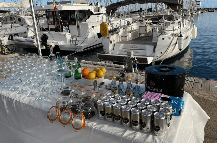 Barcelona Sunset Sailing with Gin Tonic Workshop Option - Leaving Port Olímpic as Barcelona turns gold