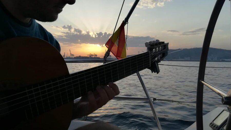Barcelona: Sunset Sailing with Live Guitar Music and Tapas - Spanish guitar at sea