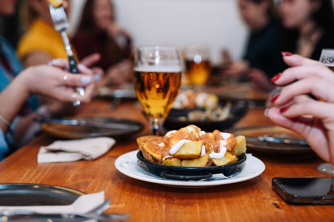 Barcelona Tapas Food Walking Tour with Wine in El Born - Croquettes and Wine on Carrer Ample