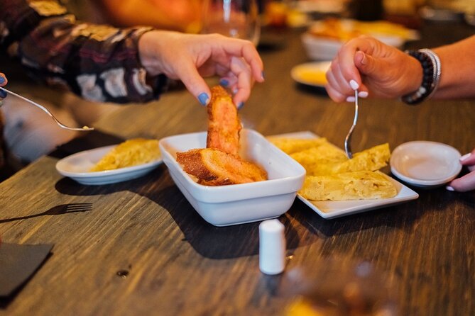 Barcelona Tapas & Wine Walking Tour with Optional Flamenco - The wine tasting is part of the conversation