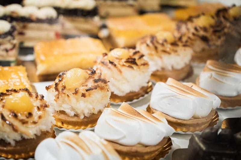 Barcelona: The Ultimate Local Tapas & Drinks Food Tour - Historic eateries and newer restaurant energy