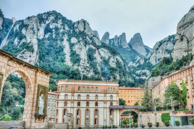 Barcelona to Montserrat Monastery: Tour, Transfers & Basilica - Inside the Abadia de Montserrat and its basilica