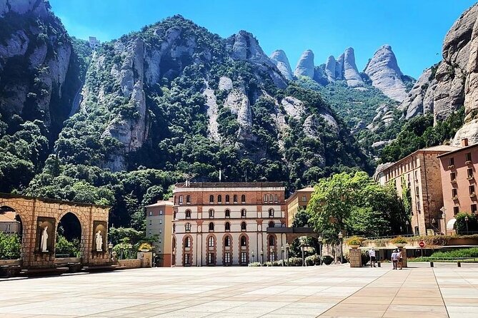 Barcelona to Montserrat Monastery: Tour, Transfers & Basilica - Arriving at Monistrol de Montserrat