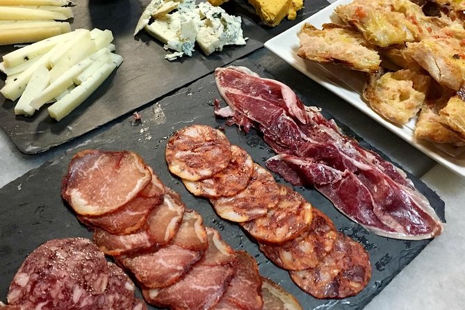 Barcelona Wine and Gourmet Tapas Tour - Reading the Eixample through its buildings and blocks