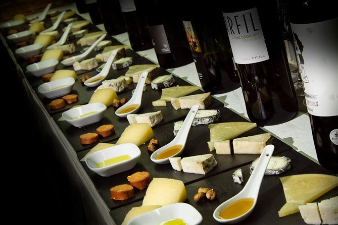 Barcelona: Wine Tasting and 5 Course Tapas Pairing Dinner - Starting with cheese, Iberian cuts, and a welcome drink