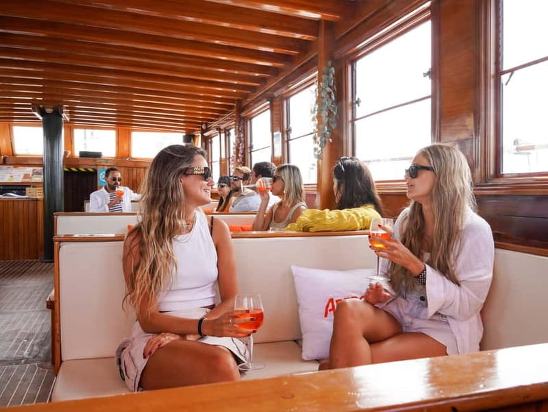Barcelona: Wooden Boat Sailing with Tapa and Welcome Drink - Three places to sit, three different moods