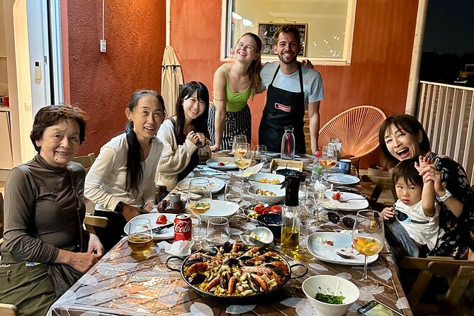 BBQ Paella in a Penthouse Terrace in Barcelona with a Chef - Victor, Kiira, and Lola as hosts