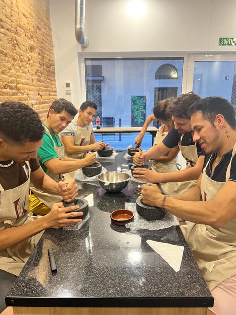 Bean to Bar Chocolate Workshop in Barcelona - Grinding cacao into cocoa paste