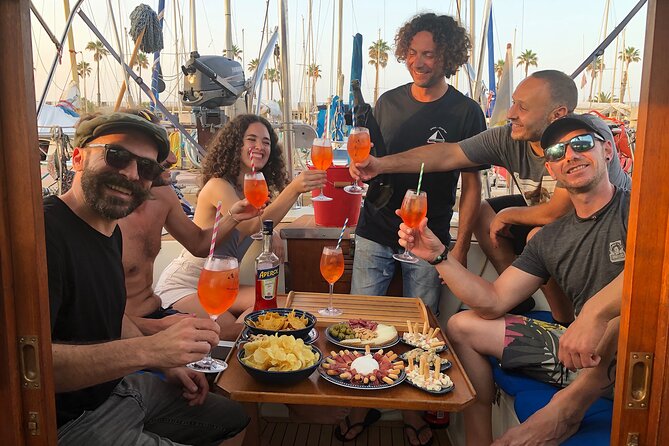 Boat Tour with Drink and Picoteo, Barcelona - Paddleboard, fishing rod, and the chance to swim