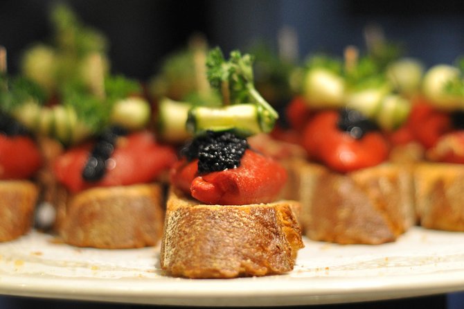 Born to Eat: Gourmet Tapas & Wine Small Group Tour in Old Barcelona - Passeig del Born and the name behind the district