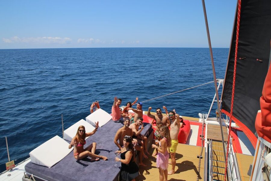 Cambrils: Catamaran Day Cruise with BBQ and Drinks - Six hours as a beach club at sea