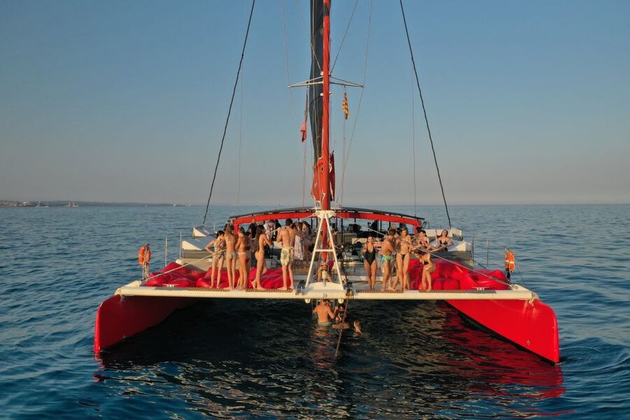 Cambrils: Catamaran Day Cruise with BBQ and Drinks - Two swimming stops, with realistic snorkeling expectations