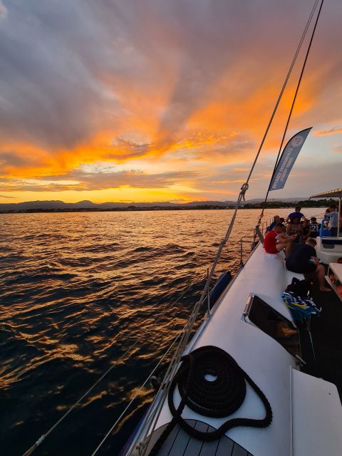 Cambrils: Costa Dorada Sunset Catamaran Cruise with Drinks - Setting out from Cambrils as the sun drops