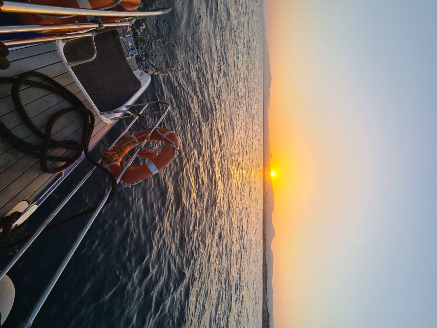 Cambrils: Costa Dorada Sunset Catamaran Cruise with Drinks - A quiet inlet and a 30-minute swim stop