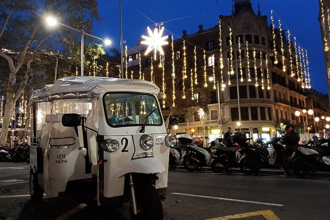 Christmas Lights Tour of Barcelona in Private Eco Tuk Tuk - La Pedrera, Robert Palace, and Casa Calvet