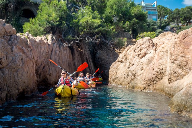 Costa Brava Kayaking and Snorkeling Small Group Tour with Lunch - Snorkeling, swimming, and the optional cliff jumps