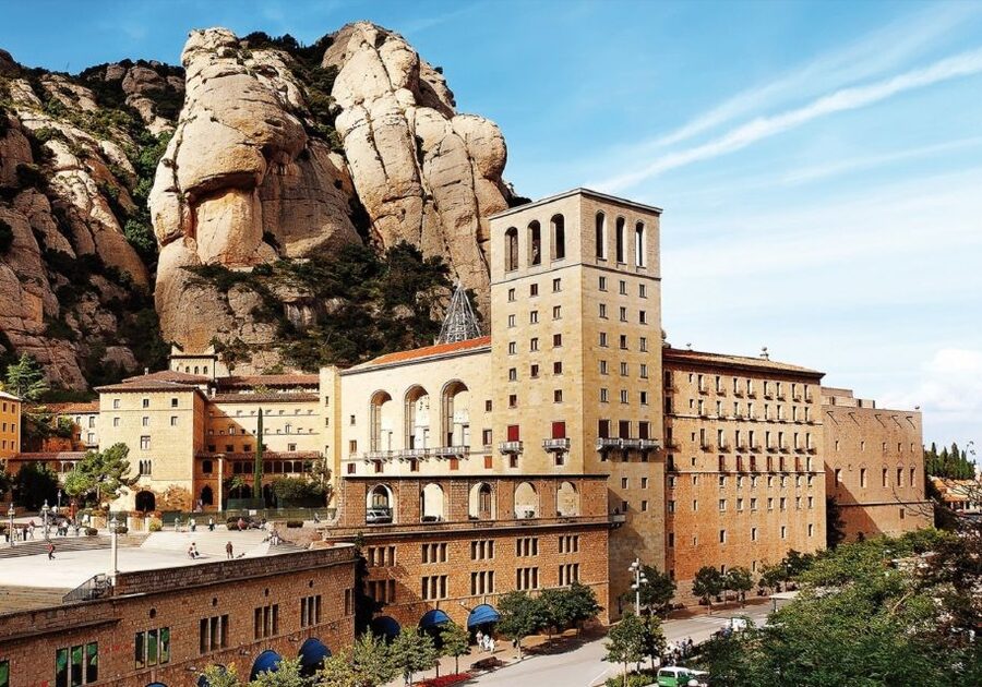 From Barcelona: Half-Day Montserrat & Horse Riding Tour - Entering the Benedictine monastery