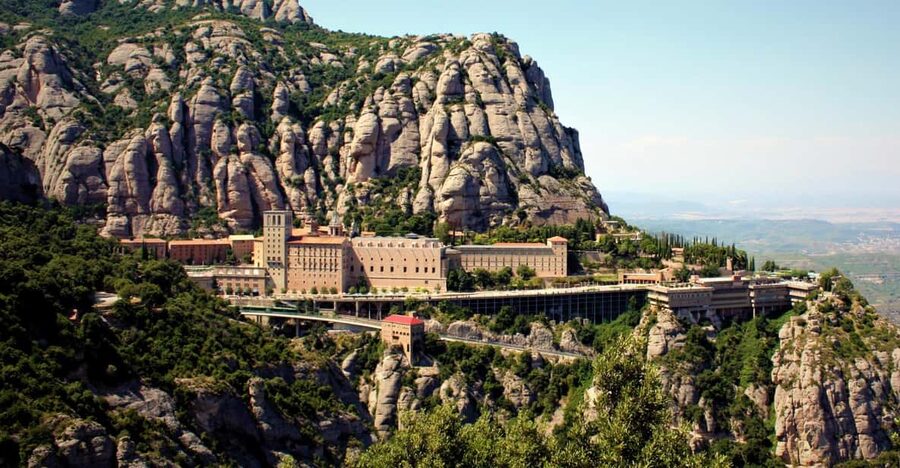From Barcelona: Half-Day Trip to Montserrat Mountain - Touring Montserrat’s medieval monastery and church