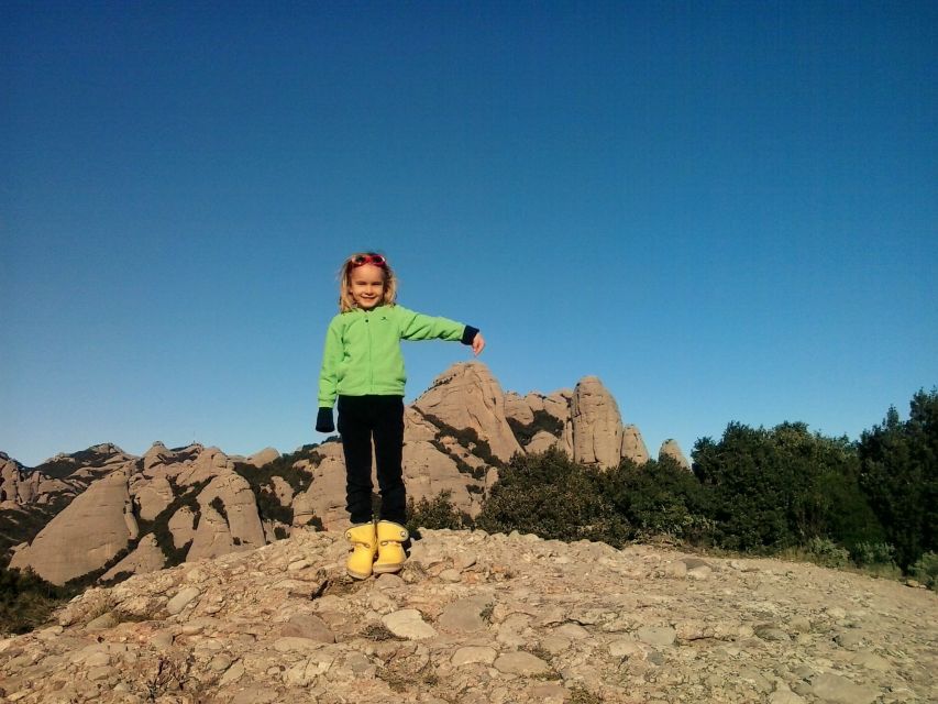 From Barcelona: Montserrat Full-Day Trip with Guided Hike - Reaching the summit and stopping at a shrine