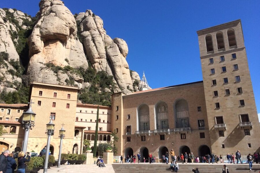 From Barcelona: Montserrat Private Guided Tour and Cable Car - Free time, the farmers market, and the choir