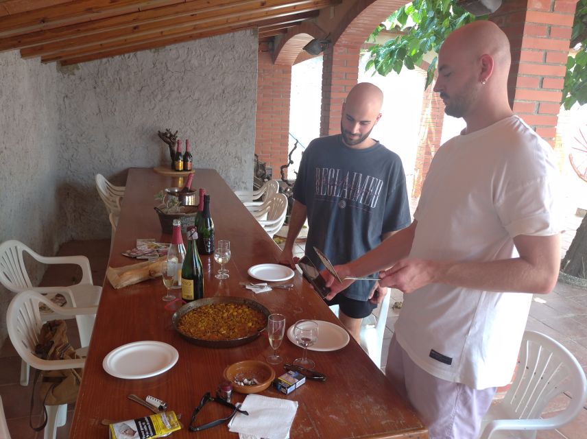 From Sitges: Paella Masterclass, Bike Ride and Winery Visit - Inside a winery with nine generations of family history