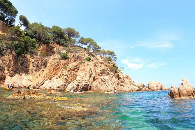 Guided Kayak & Snorkel tour to Costa Brava: Small Group and Lunch - Getting set for kayaking and snorkeling