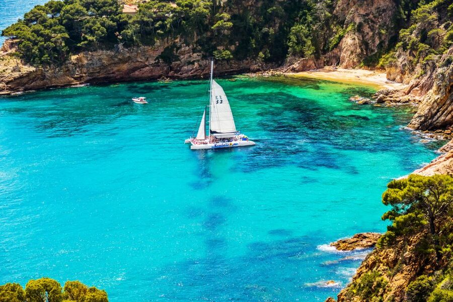 Lloret de Mar: Catamaran Sailing Cruise with BBQ and Drinks - The ride home turns up the music