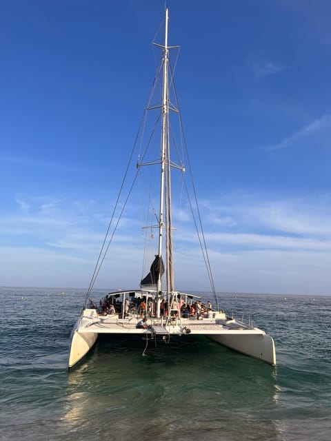 Lloret de Mar: Sunset Catamaran Cruise with DJ and Drinks - Watching the Costa Brava from the water