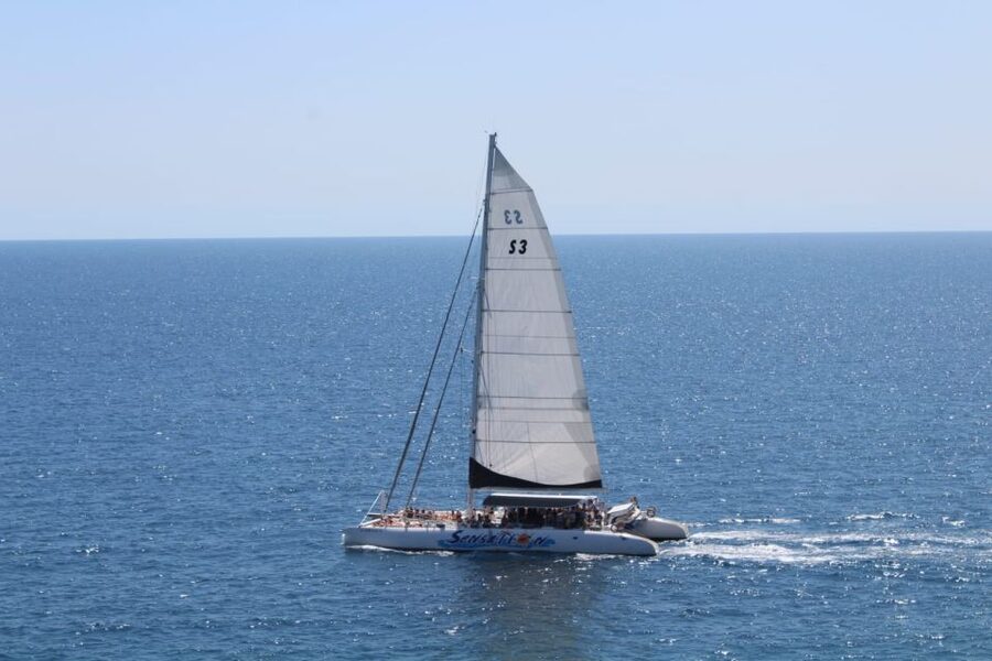 Lloret de Mar: Sunset Catamaran Cruise with DJ and Drinks - What to bring and what stays on shore