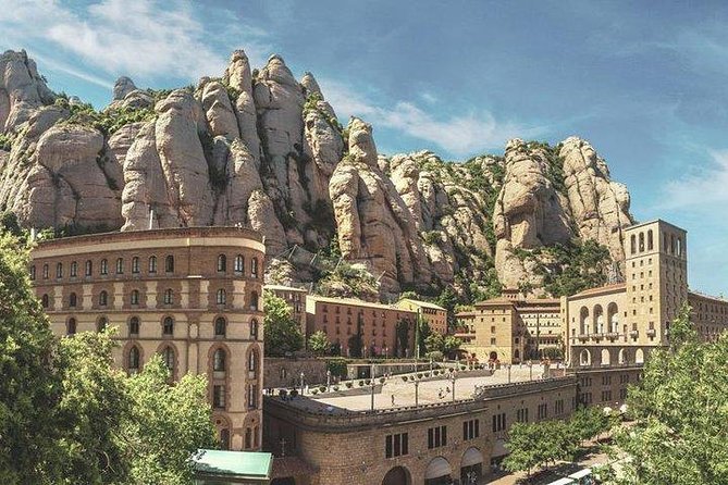 Montserrat Day Trip Private or Small Group with Basilica Tickets - Entering the Basilica to see La Moreneta