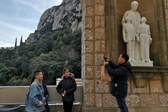 Montserrat Day Trip Private or Small Group with Basilica Tickets - Tasting Catalan food at Mercat de Montserrat