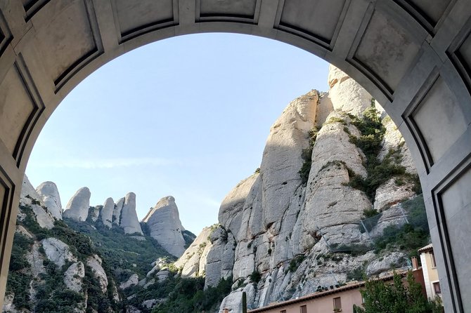 Montserrat Hiking Experience & Monastery Premium Small Group Tour - Leaving Passeig de Gracia in an eight-seat van