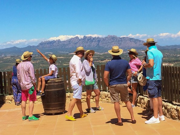 Montserrat Private Day Trip with Codorniu Cava Cellar Tasting - Catalan cheese, ham, and market time