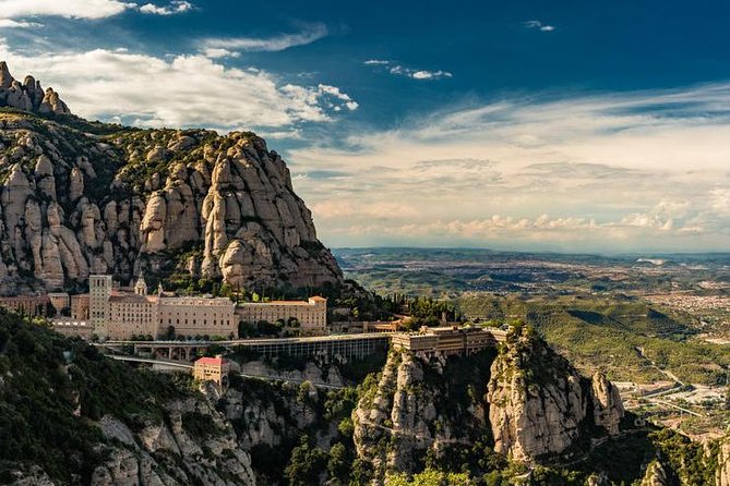 Montserrat Private Tour w/ Official Guide + Hotel or Port pick up - The AERI ride over the Llobregat valley