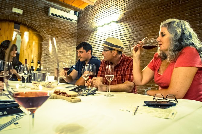 Montserrat & Winery Visit Tour with Traditional Farmhouse Lunch - The family winery and four-wine tasting