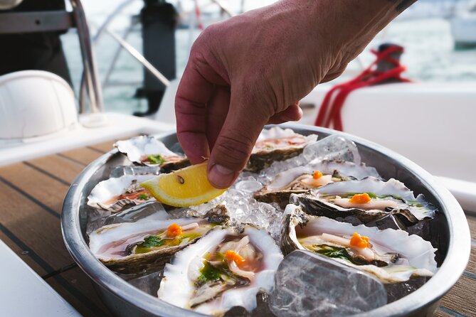 Oyster Odyssey Barcelona's Premier Sailing and Seafood Adventure - Setting out from Port Olimpic