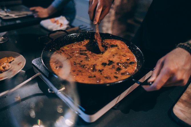 Paella Cooking Class with Professional Chef: Four Course Dinner - Cooking paella instead of just watching