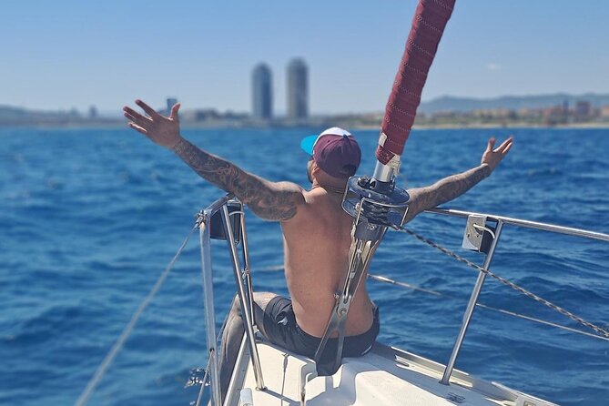 Private Sailing experience with open bar and snacks - Park Güell as a distant coastal view