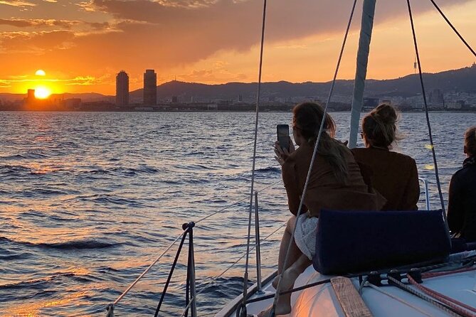 Private sailing trip from Barcelona with open bar - Snacks, Cava, and Your Own Playlist