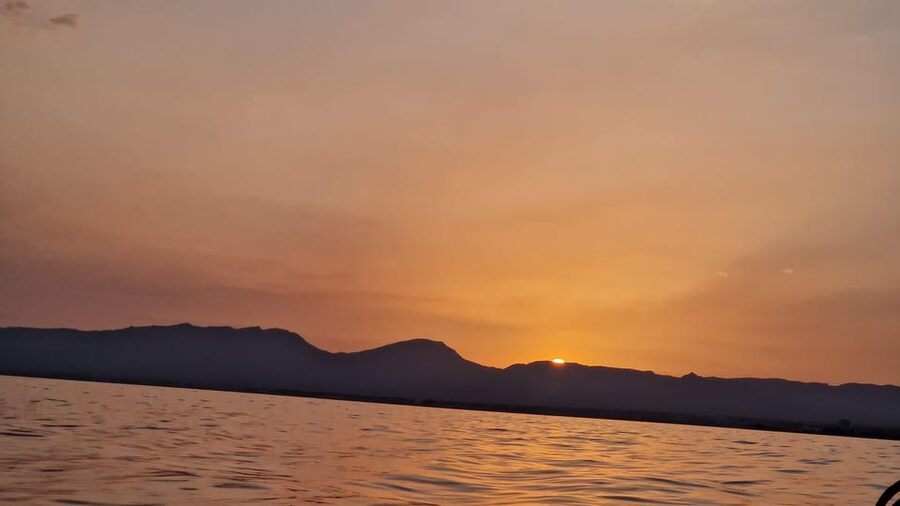 Salou: Sunset on Boat - Leaving Salou port for the open water