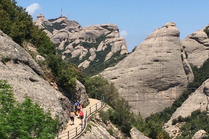 Semi-Private Montserrat Monastery, Funicular & Scenic Nature Walk - Arriving at the Monastery and Basilica