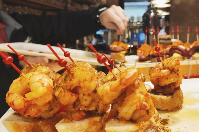 Spanish Wine and Tapas Tour in a Local Neighborhood in Barcelona - Four bars, four wines, and a changing menu