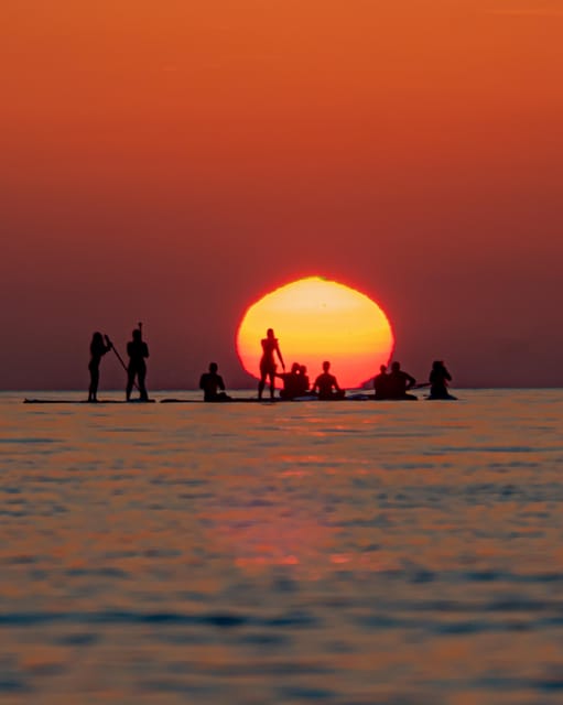 STAND UP PADLE SURF SUNRISE+BREAKFAST+PHOTOS&VIDEOSPRO+GUIDE - Starting before Barcelona wakes up