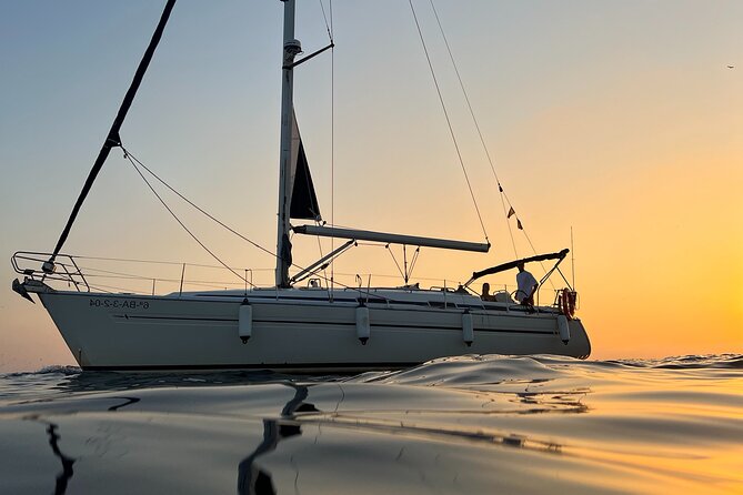 Sunset Sailing Cruise in Barcelona led by Young & Local Captain - Drinks, snacks, and the Polaroid keepsake