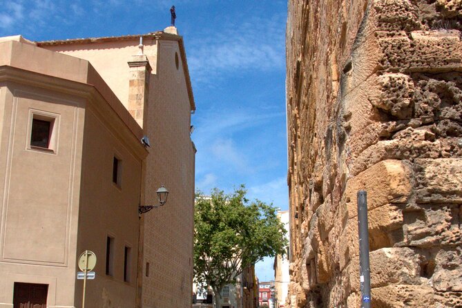 Tarragona Walking Tour: An Audio Guide to Tarraco - Medieval defenses, the city gate, and changing Tarragona