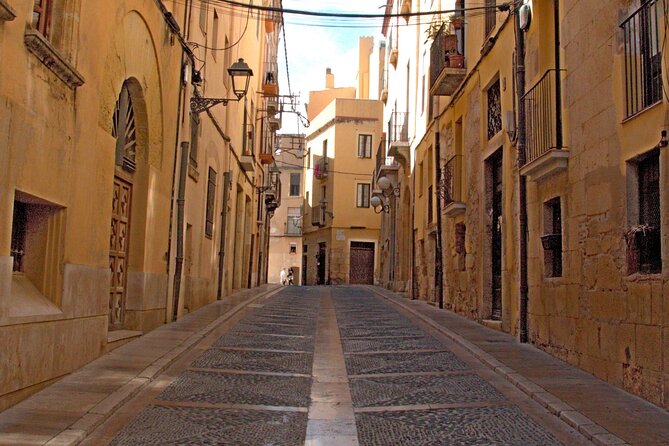 Tarragona Walking Tour: An Audio Guide to Tarraco - The amphitheater and Miracle Beach views