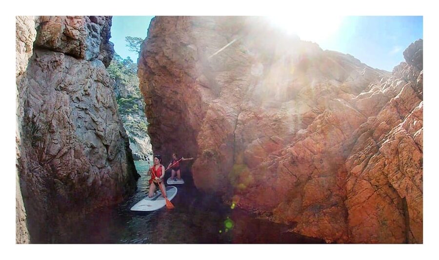 Tossa de Mar: Guided Route in Paddle Surfing&Coves and Caves - Entering sea caves and narrow passages