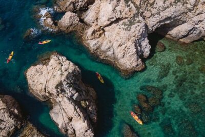 Kayak & Snorkel Tour with Paella from Barcelona